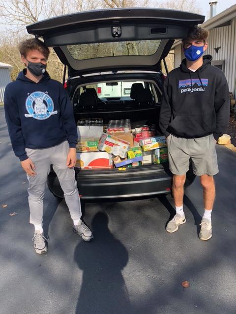 Ryan and Kevin loading the van